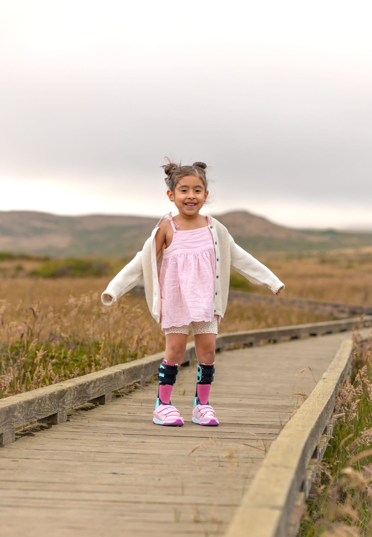 Amelie smiling while wearing Piro Spring AFOs